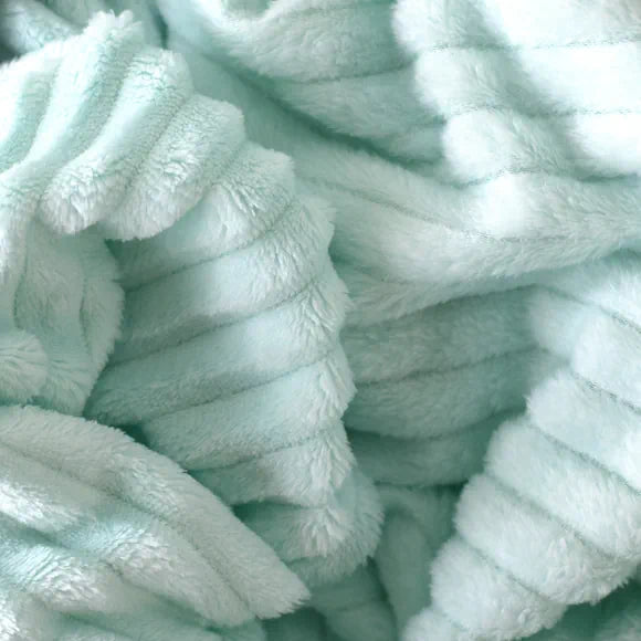 Cobija piel de conejo textura acanalada