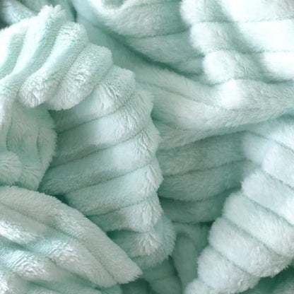 Cobija piel de conejo textura acanalada